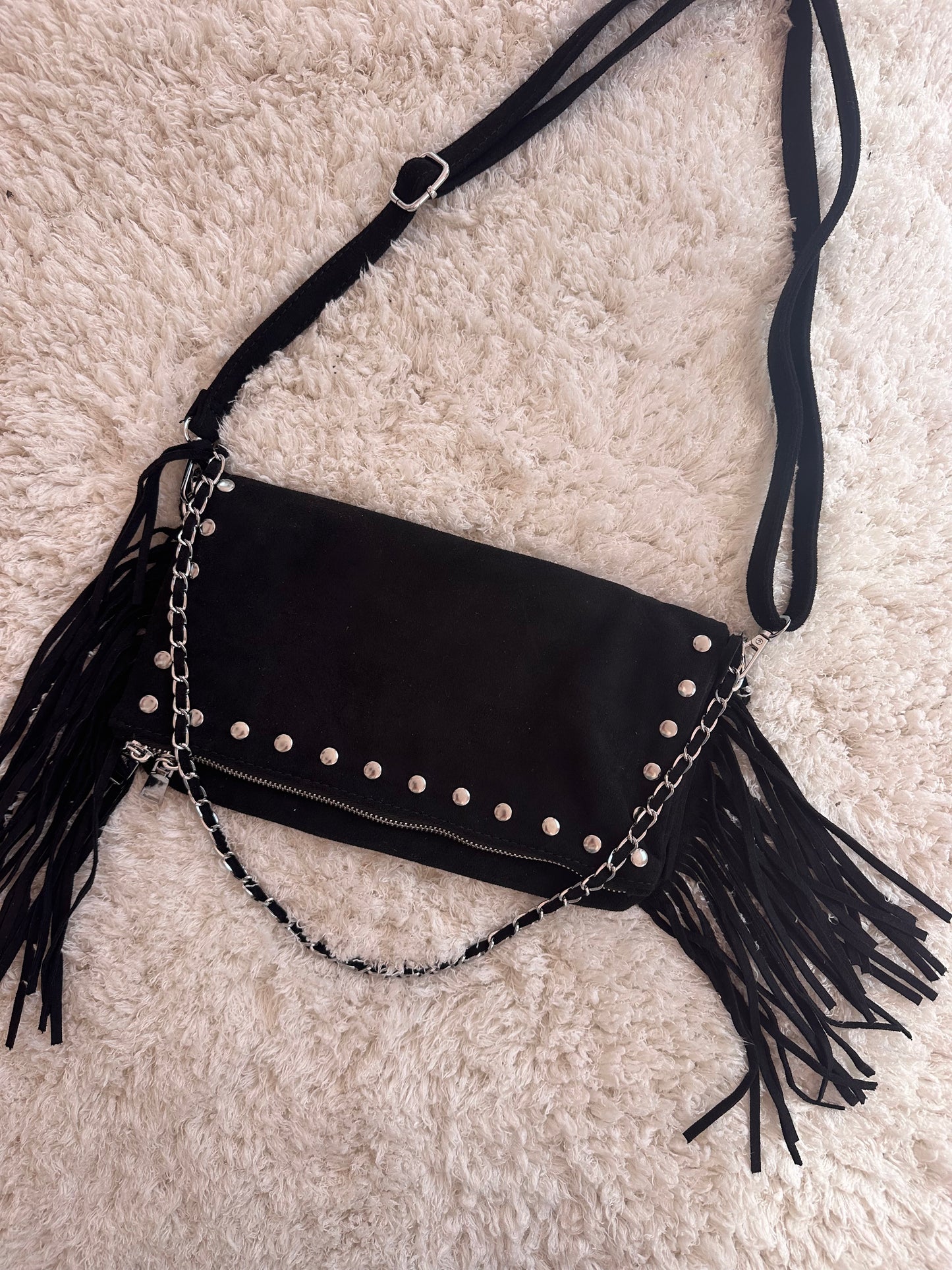 Mala com tachas