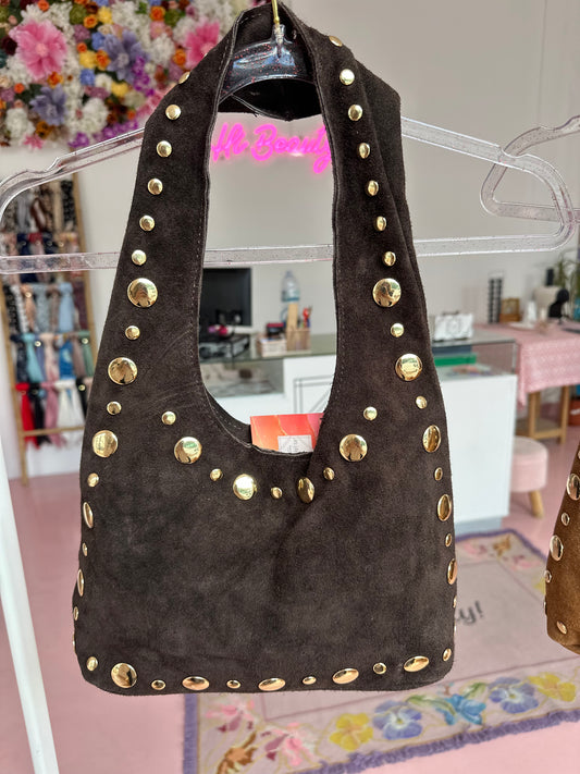 Mala com tachas